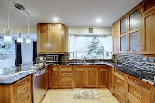 Photo 8: 1311 70 Avenue SW in Calgary: Kelvin Grove Detached for sale : MLS®# A1214141