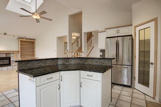 Photo 14: 243 ARBOUR CREST Road NW in Calgary: Arbour Lake Detached for sale : MLS®# C4295620