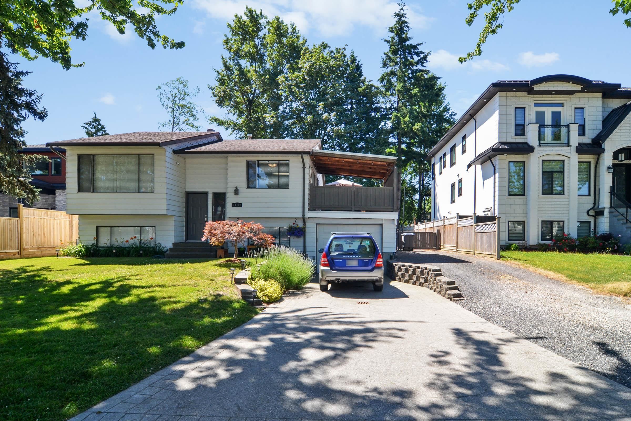 Main Photo: 14128 75A Avenue in Surrey: East Newton House for sale : MLS®# R2708662