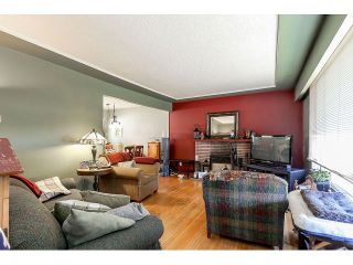 Photo 2: 714 IVY Avenue in Coquitlam: Coquitlam West House for sale : MLS®# V1131997