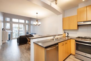 Photo 2: 411 9339 UNIVERSITY Crescent in Burnaby: Simon Fraser Univer. Condo for sale in "HARMONY AT THE HIGHLANDS" (Burnaby North)  : MLS®# R2576436