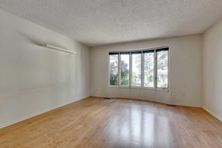 Photo 3: 908 Mckinnon Drive NE in Calgary: Mayland Heights Semi Detached (Half Duplex) for sale : MLS®# A2141379