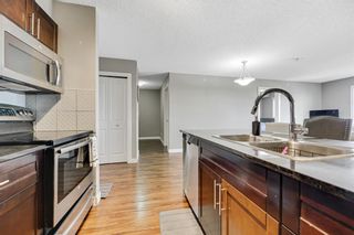 Photo 2: 411 5 Saddlestone Way NE in Calgary: Saddle Ridge Apartment for sale : MLS®# A1252434