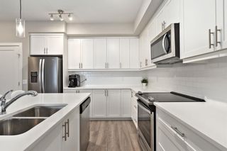 Photo 5: 408 100 Auburn Meadows Manor SE in Calgary: Auburn Bay Apartment for sale : MLS®# A2107067