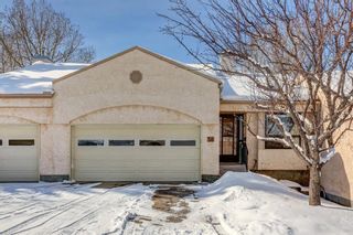 Main Photo: 58 Sandarac Circle NW in Calgary: Sandstone Valley Row/Townhouse for sale : MLS®# A2032458