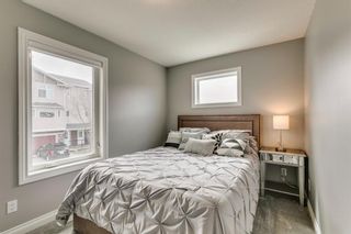 Photo 25: 308 Strathcona Circle: Strathmore Row/Townhouse for sale : MLS®# A1212892