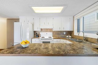 Photo 7: 11 Edgeford Way NW in Calgary: Edgemont Detached for sale : MLS®# A2080645
