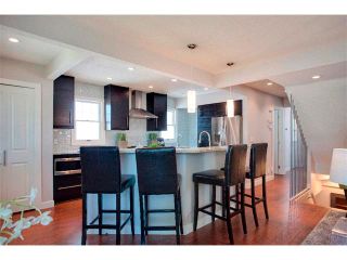 Photo 7: 1049 REGAL Crescent NE in Calgary: Renfrew_Regal Terrace House for sale : MLS®# C4013292