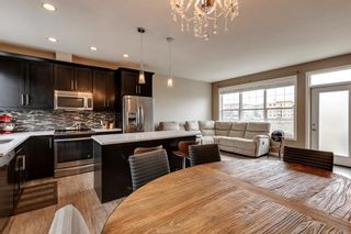Photo 7: 114 Nolan Hill Heights NW in Calgary: Nolan Hill Row/Townhouse for sale : MLS®# A2047651