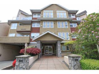 Photo 1: 105 1630 154 Street in Surrey: King George Corridor Condo for sale in "CARLTON COURT" (South Surrey White Rock)  : MLS®# F1438775