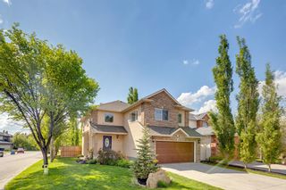 Photo 1: 107 Strathlea Place SW in Calgary: Strathcona Park Detached for sale : MLS®# A2052090
