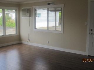 Photo 4: 307 201 CAYER Street in Coquitlam: Maillardville Manufactured Home  in "WILDWOOD PARK" : MLS®# V1068018