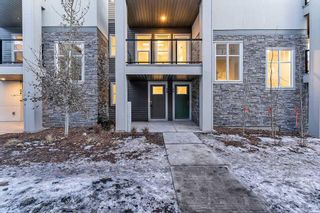Photo 1: 58 Spring Creek Common SW in Calgary: Springbank Hill Row/Townhouse for sale : MLS®# A2098145