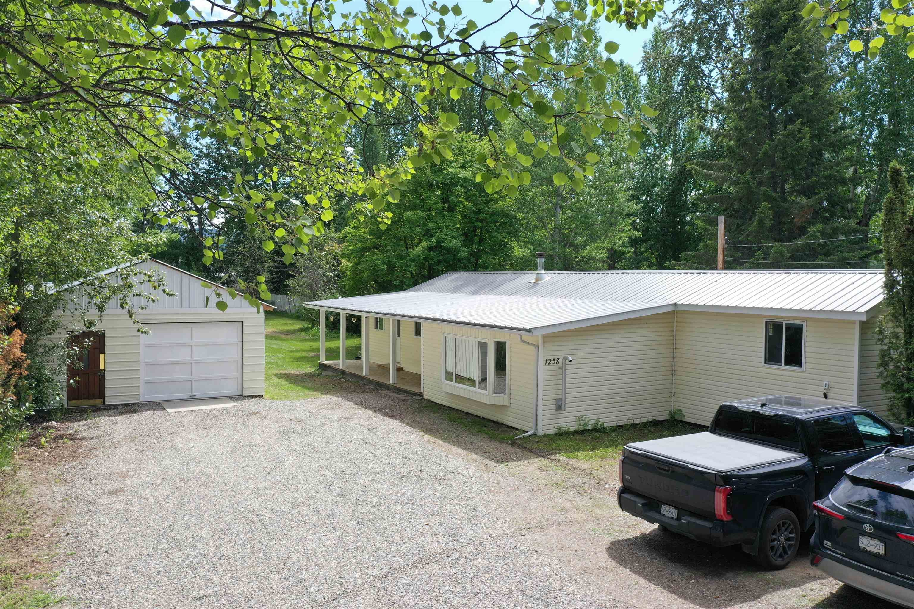 Main Photo: 1238 BASS Road in Quesnel: Red Bluff/Dragon Lake Manufactured Home for sale : MLS®# R2783445