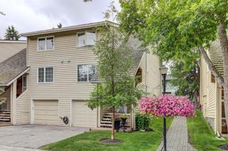 Photo 2: 402 Point Mckay Gardens NW in Calgary: Point McKay Row/Townhouse for sale : MLS®# A1210381