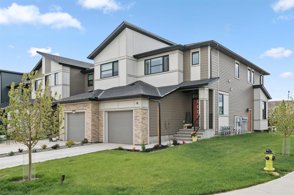 Main Photo: 41 Wolf Creek Manor SE in Calgary: C-281 Semi Detached for sale : MLS®# A1241778