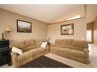 Photo 5: 197 QUIGLEY Drive: Cochrane House for sale : MLS®# C4015396