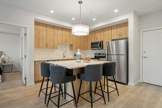 Photo 3: 209 71 Shawnee Common SW in Calgary: Shawnee Slopes Apartment for sale : MLS®# A2129391