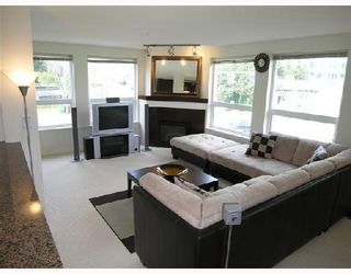 Photo 1: 210 6888 SOUTHPOINT Drive in Burnaby: South Slope Condo for sale in "CORTINA" (Burnaby South)  : MLS®# V699290