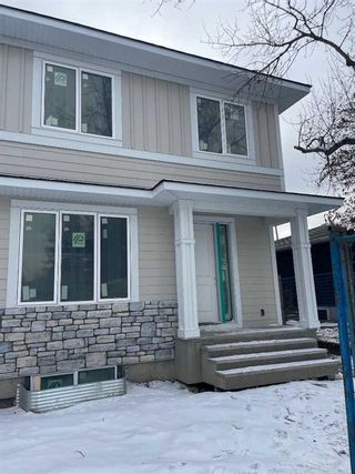 Photo 1: 341 Hendon Drive NW in Calgary: Highwood Semi Detached (Half Duplex) for sale : MLS®# A2081290