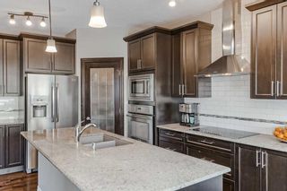 Photo 4: 168 Cougar Ridge Manor SW in Calgary: Cougar Ridge Detached for sale : MLS®# A2123465
