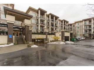 Photo 1: 211 9655 KING GEORGE Boulevard in Surrey: Whalley Condo for sale in "GRUV" (North Surrey)  : MLS®# R2139260