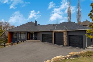 Photo 1: 34 Elveden Drive SW in Calgary: Springbank Hill Detached for sale : MLS®# A2121297