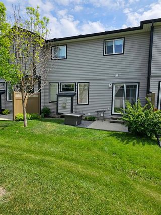 Photo 4: 24 102 Canoe Square SW: Airdrie Row/Townhouse for sale : MLS®# A2055051
