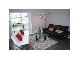 Photo 3: 107 2273 TRIUMPH Street in Vancouver: Hastings Townhouse for sale (Vancouver East)  : MLS®# V1126551