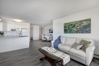 Photo 3: 2109 7451 Springbank Boulevard SW in Calgary: Springbank Hill Apartment for sale : MLS®# A2034205