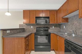 Photo 11: 202 120 Country Village Circle NE in Calgary: Country Hills Village Apartment for sale : MLS®# A2053425