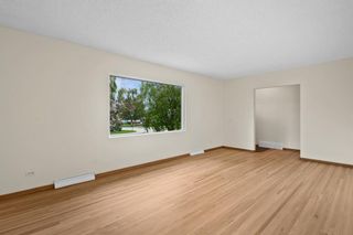 Photo 6: 319 Spyhill Road NW in Calgary: Thorncliffe Detached for sale : MLS®# A1233288