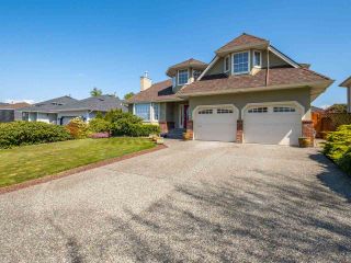 Photo 2: 4516 217A Street in Langley: Murrayville House for sale : MLS®# R2570732