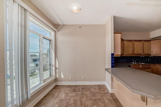 Photo 8: 402 4 14 Street NW in Calgary: Hillhurst Apartment for sale : MLS®# A2130956