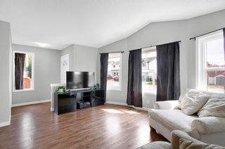 Photo 2: 2452 Riverstone Road SE in Calgary: Riverbend Detached for sale : MLS®# A2040734