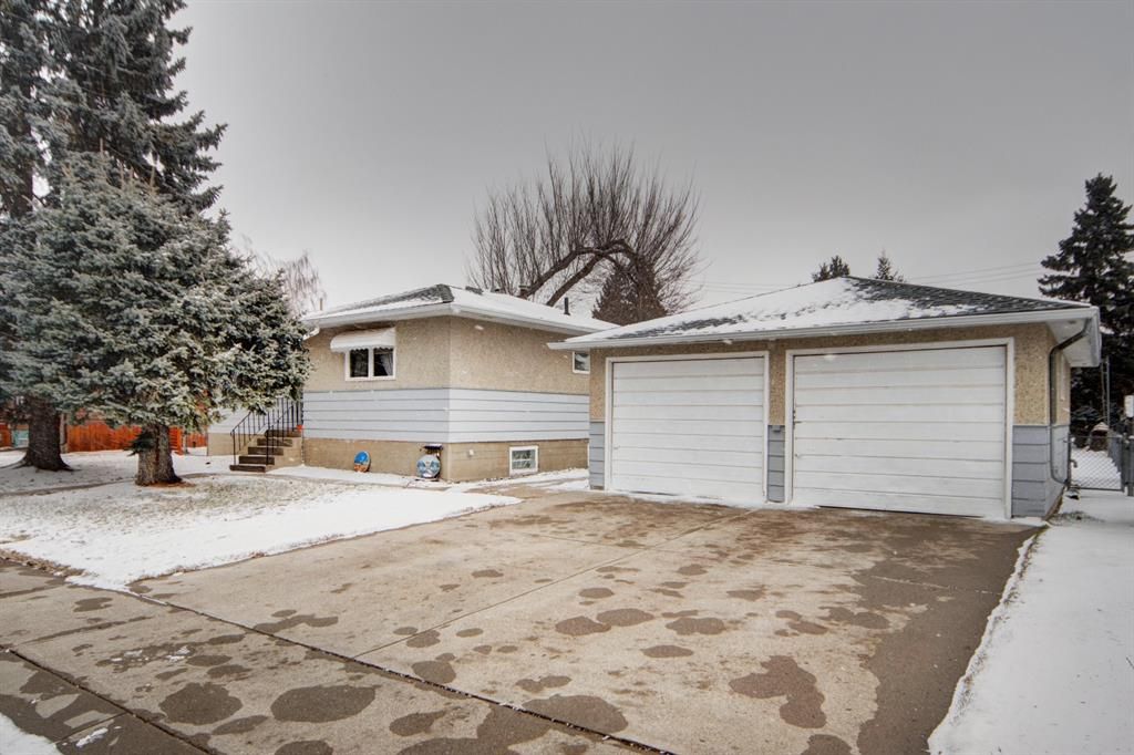 This Bungalow is on a HUGE double size  lot 9600sq ft, with front drive access to garage.