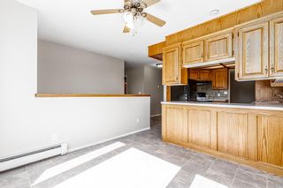 Photo 9: 1102 Whitfield Avenue: Crossfield Detached for sale : MLS®# A1144920
