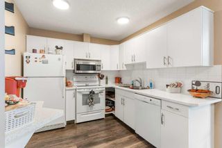 Photo 2: 406 20 Sierra Morena Mews SW in Calgary: Signal Hill Apartment for sale : MLS®# A2127080