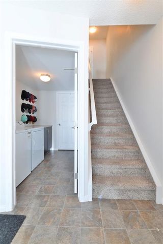 Photo 4: 104 Windstone Link SW: Airdrie Row/Townhouse for sale : MLS®# A1190179