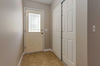 Photo 3: 504 2200 Woodview Drive SW in Calgary: Woodlands Row/Townhouse for sale : MLS®# A2140758