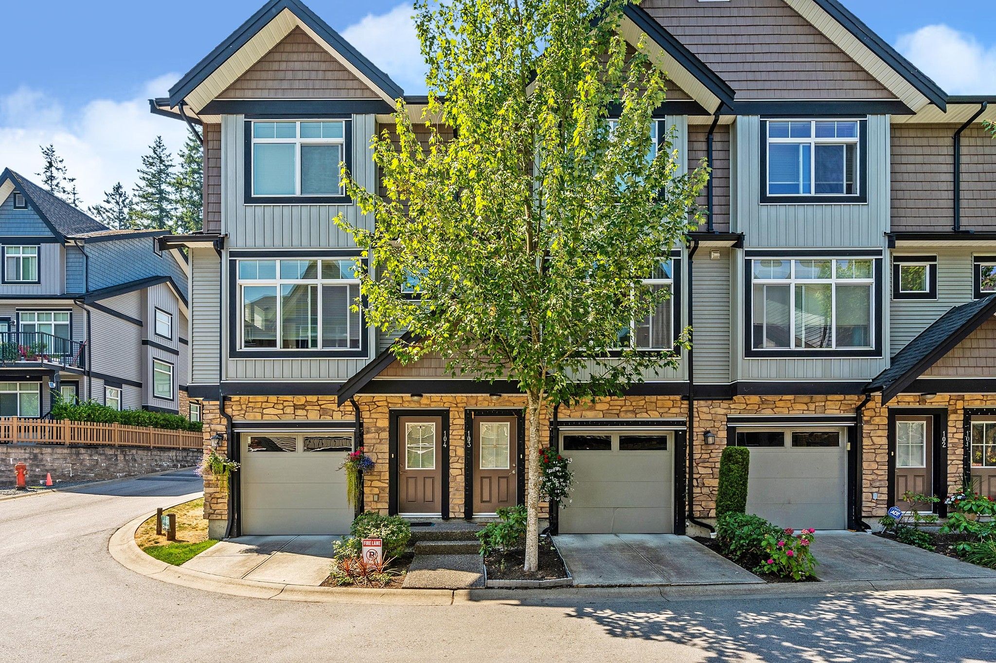 Main Photo: 103 6299 144 Street in Surrey: Sullivan Station Townhouse for sale in "Altura" : MLS®# R2608972