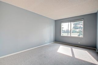 Photo 3: 77 Edgehill Drive NW in Calgary: Edgemont Semi Detached (Half Duplex) for sale : MLS®# A2001560