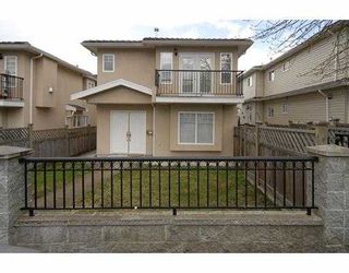 Photo 1: 5015 NORFOLK Street in Burnaby: Central BN 1/2 Duplex for sale (Burnaby North)  : MLS®# V701551