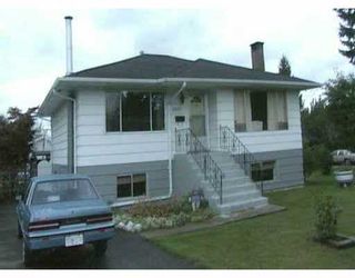 Photo 1: 1402 COMO LAKE AV in Coquitlam: Central Coquitlam House for sale : MLS®# V536066