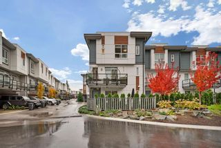 Photo 1: 103 7947 209 Street in Langley: Willoughby Heights Townhouse for sale in "LUXIA" : MLS®# R2832080
