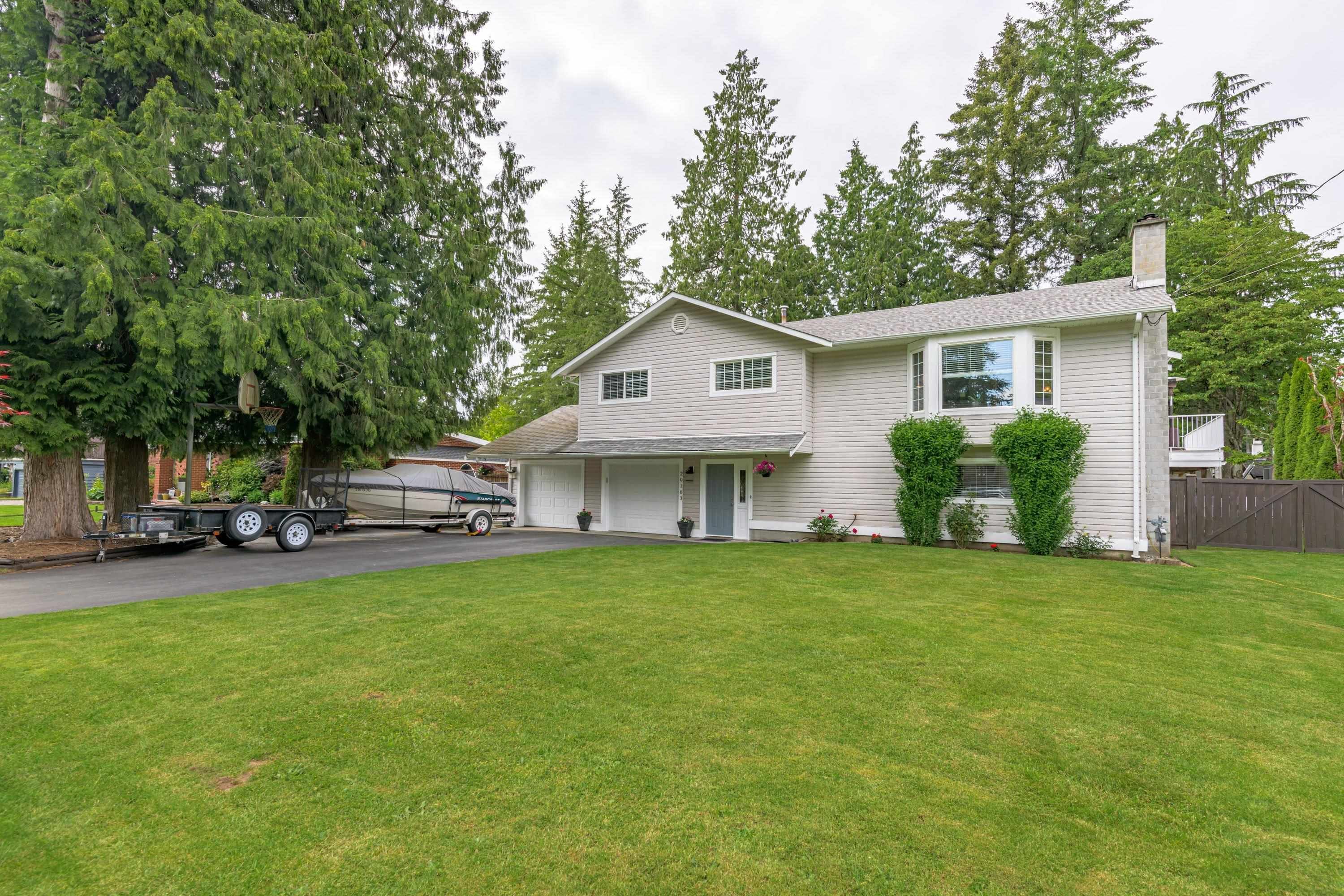Main Photo: 20103 42A Avenue in Langley: Brookswood Langley House for sale in "Brookswood" : MLS®# R2724533