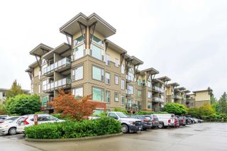 Photo 1: 208 33539 HOLLAND Avenue in Abbotsford: Central Abbotsford Condo for sale in "The Crossing" : MLS®# R2826676