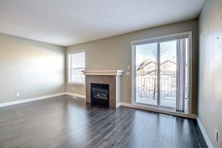 Photo 5: 384 Panatella Boulevard NW in Calgary: Panorama Hills Row/Townhouse for sale : MLS®# A2011748