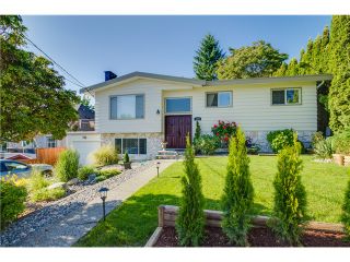 Photo 1: 1985 PETERSON Avenue in Coquitlam: Cape Horn House for sale : MLS®# V1067810