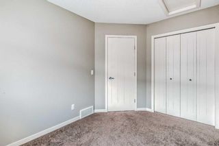 Photo 26: 227 Panatella Walk NW in Calgary: Panorama Hills Row/Townhouse for sale : MLS®# A2074189